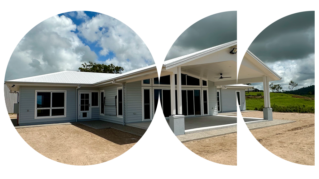 New home with a covered patio on a cleared block under a cloudy sky